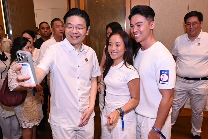 Attendees with PM Lawrence Wong at YP40
